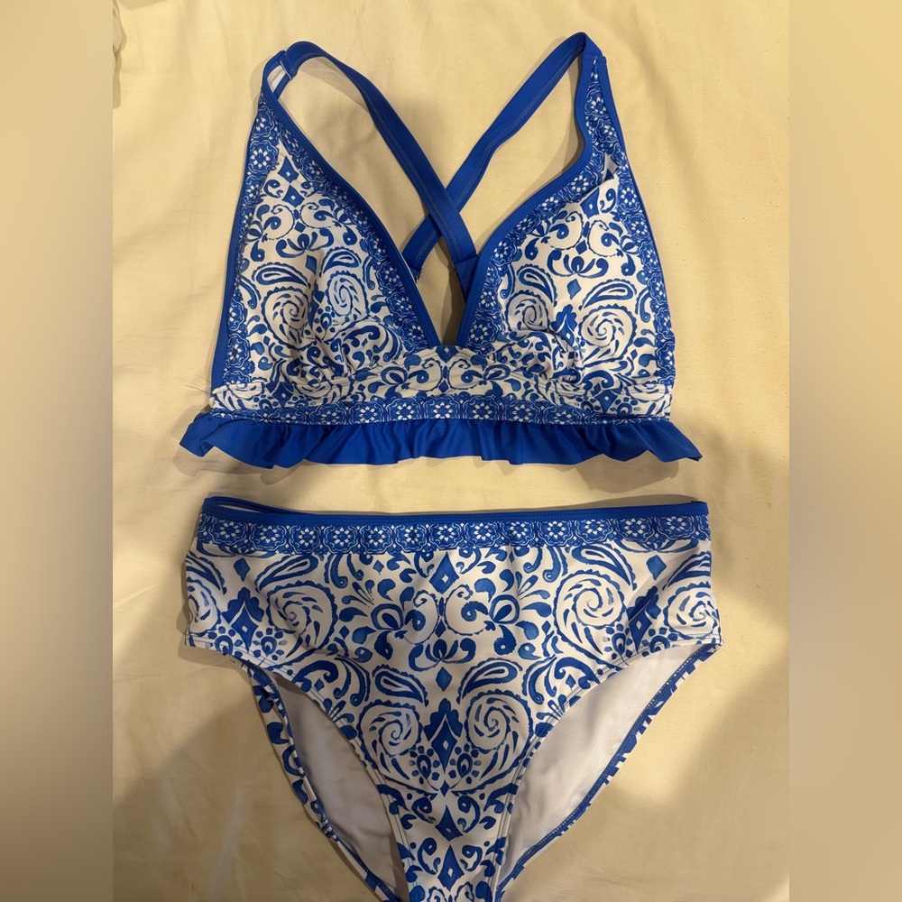 Elegant Blue and White Floral Bikini with Cross-Back Straps